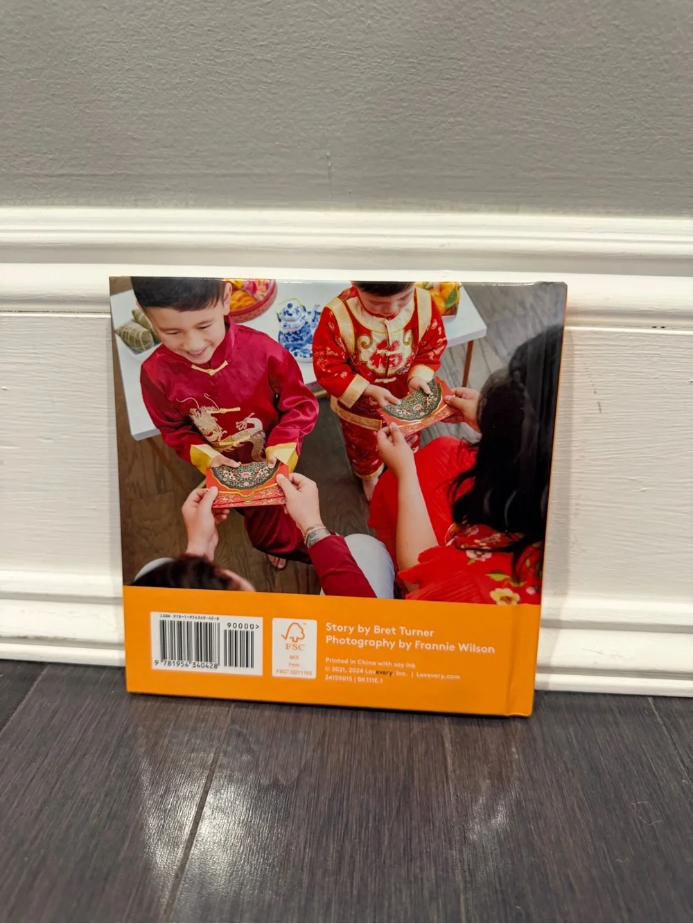 Lovevery Red Lunar New Year Hardcover Storybook A Haircut for Lunar New Year